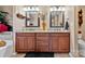 Spacious bathroom with double vanities, granite countertops, and modern fixtures, offering both style and functionality at 124 Muirfield Dr, Kings Mountain, NC 28086