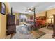 Elegant bedroom featuring a four-poster bed, neutral walls, patterned rug, and a large window for ample natural light at 124 Muirfield Dr, Kings Mountain, NC 28086