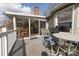 A view of the deck, with outdoor seating, which has access to the sunroom at 124 Muirfield Dr, Kings Mountain, NC 28086