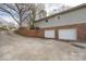 Spacious two-car garage with a brick foundation and a long driveway at 124 Muirfield Dr, Kings Mountain, NC 28086