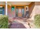 Inviting front entrance with rocking chair at 1300 Old Farm Rd, Charlotte, NC 28226