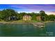 Luxury waterfront home with private dock and boat lift at 132 Rollingwood Ln, Mooresville, NC 28117