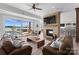 Spacious basement with a fireplace and sliding doors leading to lake view at 132 Rollingwood Ln, Mooresville, NC 28117