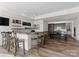 Basement wet bar with seating and lake views at 132 Rollingwood Ln, Mooresville, NC 28117