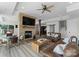 Finished basement with a fireplace, seating area, and wet bar at 132 Rollingwood Ln, Mooresville, NC 28117