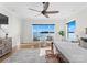 Main bedroom with lake views and ceiling fan at 132 Rollingwood Ln, Mooresville, NC 28117