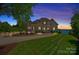 Stunning curb appeal of two-story home with landscaped yard at 132 Rollingwood Ln, Mooresville, NC 28117