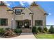 Elegant entryway with double doors and landscaping at 132 Rollingwood Ln, Mooresville, NC 28117