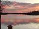 Breathtaking sunset view over the calm lake waters at 132 Rollingwood Ln, Mooresville, NC 28117