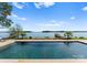 Stunning lake view from a luxurious pool at 132 Rollingwood Ln, Mooresville, NC 28117