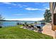 Relaxing patio with pool and stunning lake views at 132 Rollingwood Ln, Mooresville, NC 28117