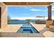 Relaxing pool and spa area with lake views at 132 Rollingwood Ln, Mooresville, NC 28117