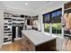 Spacious walk-in closet with ample shelving and drawers at 132 Rollingwood Ln, Mooresville, NC 28117