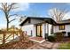 Back exterior view of the house with a deck and white brick at 1479 Oakwood Ave, Kannapolis, NC 28081