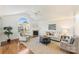 Living room with hardwood floors, fireplace and natural light at 2248 Coltsview Ln, Matthews, NC 28105