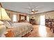 Bedroom with wooden furniture and access to balcony at 2448 Moss Farm Rd, Hickory, NC 28602