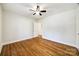 Hardwood floors and ceiling fan in this bright bedroom at 2861 Sharon Rd, Charlotte, NC 28211
