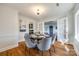 Bright dining room with hardwood floors and French doors to the living room at 2861 Sharon Rd, Charlotte, NC 28211