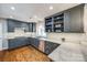 Updated kitchen with gray cabinets and quartz countertops at 2861 Sharon Rd, Charlotte, NC 28211