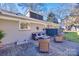 Relaxing patio area with brick paving and seating at 2861 Sharon Rd, Charlotte, NC 28211