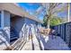 Cozy patio area with small table and chairs, adjacent to the house at 2861 Sharon Rd, Charlotte, NC 28211
