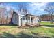 Side view of charming cottage with metal roof at 326 Stanley Spencer Mtn Rd, Gastonia, NC 28056