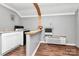 Small kitchen with granite countertops and white cabinets at 326 Stanley Spencer Mtn Rd, Gastonia, NC 28056