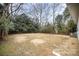 Simple backyard with mostly cleared land at 433 Greenwood Dr, Charlotte, NC 28217