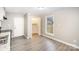 Kitchen boasts ample cabinet space and vinyl flooring at 433 Greenwood Dr, Charlotte, NC 28217