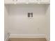 Laundry closet with hookups and vinyl flooring at 433 Greenwood Dr, Charlotte, NC 28217