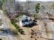 Bird's eye view of a charming home, showing its well-maintained landscaping and convenient road access and a large lawn at 4465 Red Hill Cir, Denver, NC 28037