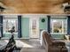 Bonus room featuring an exercise bike, windows and a backyard view at 4465 Red Hill Cir, Denver, NC 28037