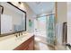 Clean bathroom with tub shower, vanity, and updated fixtures at 5002 Looking Glass Trl, Denver, NC 28037