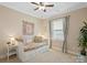 Bedroom with daybed, window, and decorative wall art at 5002 Looking Glass Trl, Denver, NC 28037