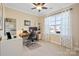 Bright home office features built-in shelving and large window at 5002 Looking Glass Trl, Denver, NC 28037