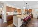 Island kitchen with granite countertops and stainless steel appliances at 5002 Looking Glass Trl, Denver, NC 28037
