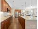 Modern kitchen with stainless steel appliances and granite counters at 5002 Looking Glass Trl, Denver, NC 28037