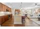 Open concept kitchen with granite island and stainless steel appliances at 5002 Looking Glass Trl, Denver, NC 28037