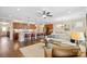 Open concept kitchen and living area with hardwood floors at 5002 Looking Glass Trl, Denver, NC 28037