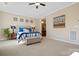 Main bedroom with ensuite bathroom access and a ceiling fan at 5002 Looking Glass Trl, Denver, NC 28037