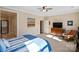 Main bedroom with large windows and a ceiling fan at 5002 Looking Glass Trl, Denver, NC 28037
