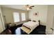 Bedroom with dark hardwood floors and large windows at 507 E Third Ave, Gastonia, NC 28054