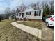 Charming single-Gathering home with a welcoming front porch and well-maintained lawn at 640 Mckee St, Albemarle, NC 28001
