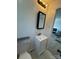 Bright bathroom with vanity and mirror, open to the nearby living area at 640 Mckee St, Albemarle, NC 28001