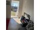Inviting entryway with hardwood floors, open door, and a view of the neighborhood at 640 Mckee St, Albemarle, NC 28001