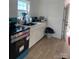 Well-lit kitchen featuring modern appliances, ample counter space, and white cabinets at 640 Mckee St, Albemarle, NC 28001