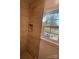 Tiled shower with a window and niche, offering a bright and modern space at 640 Mckee St, Albemarle, NC 28001
