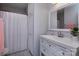 Well-appointed bathroom with white vanity and a walk-in shower at 6742 Constitution Ln, Charlotte, NC 28210