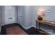Bright entryway with a console table and a large door at 6742 Constitution Ln, Charlotte, NC 28210