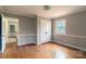 Bright bedroom with hardwood floors and double closet at 6800 April Ln, Charlotte, NC 28215
